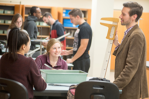 Pictured is Professor Brendan Mullan, Ph.D., with NSET students. | Photo by Chris Rolinson